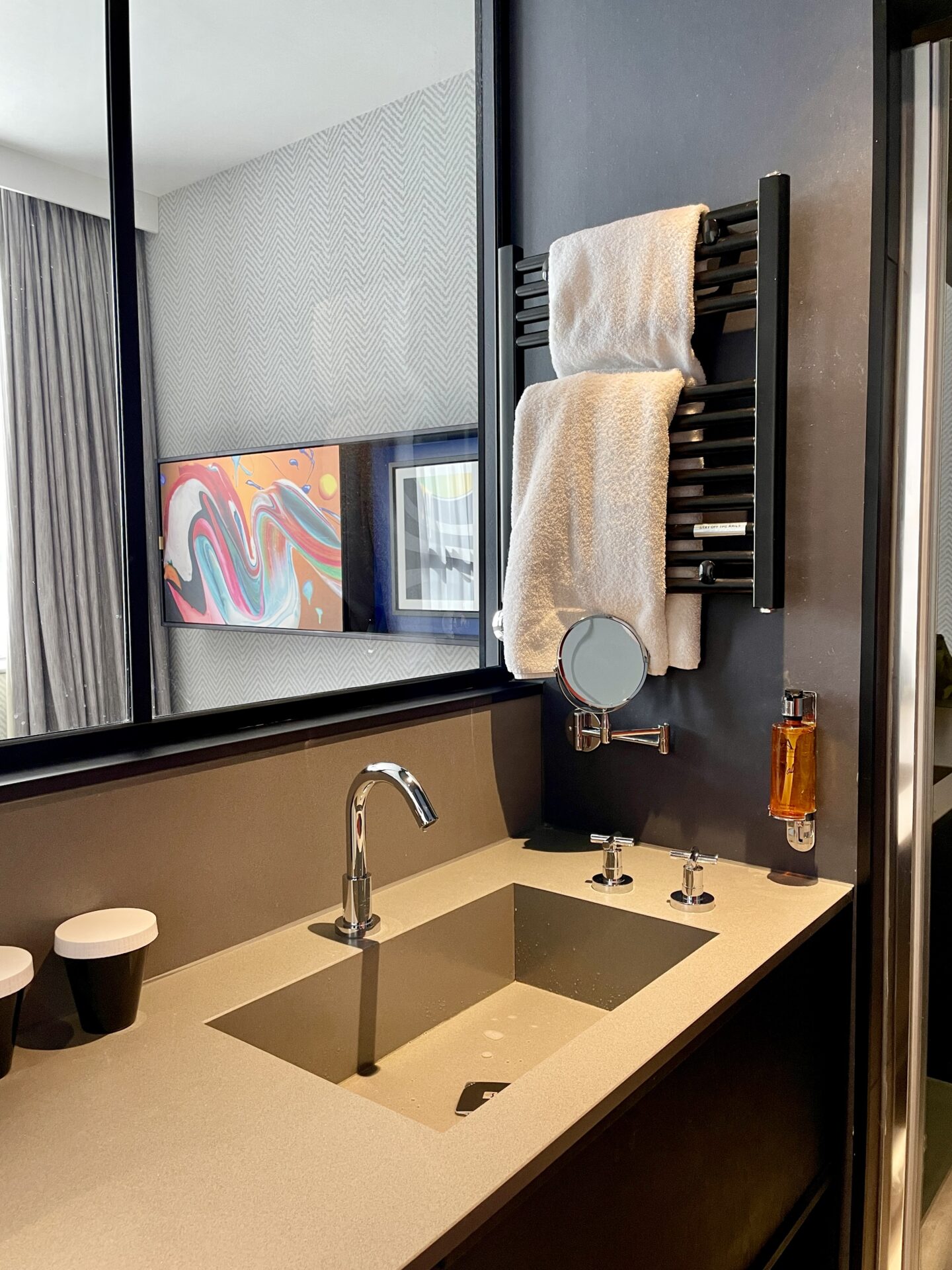 The bathroom and dressing area in a standard room at Malmaison York