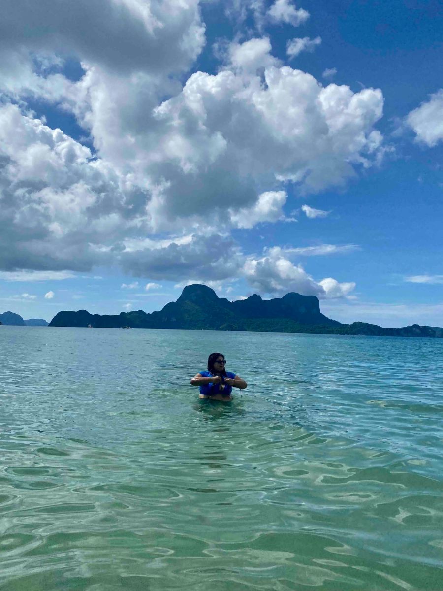Nishi in the sea at Lio Beach, El Nido