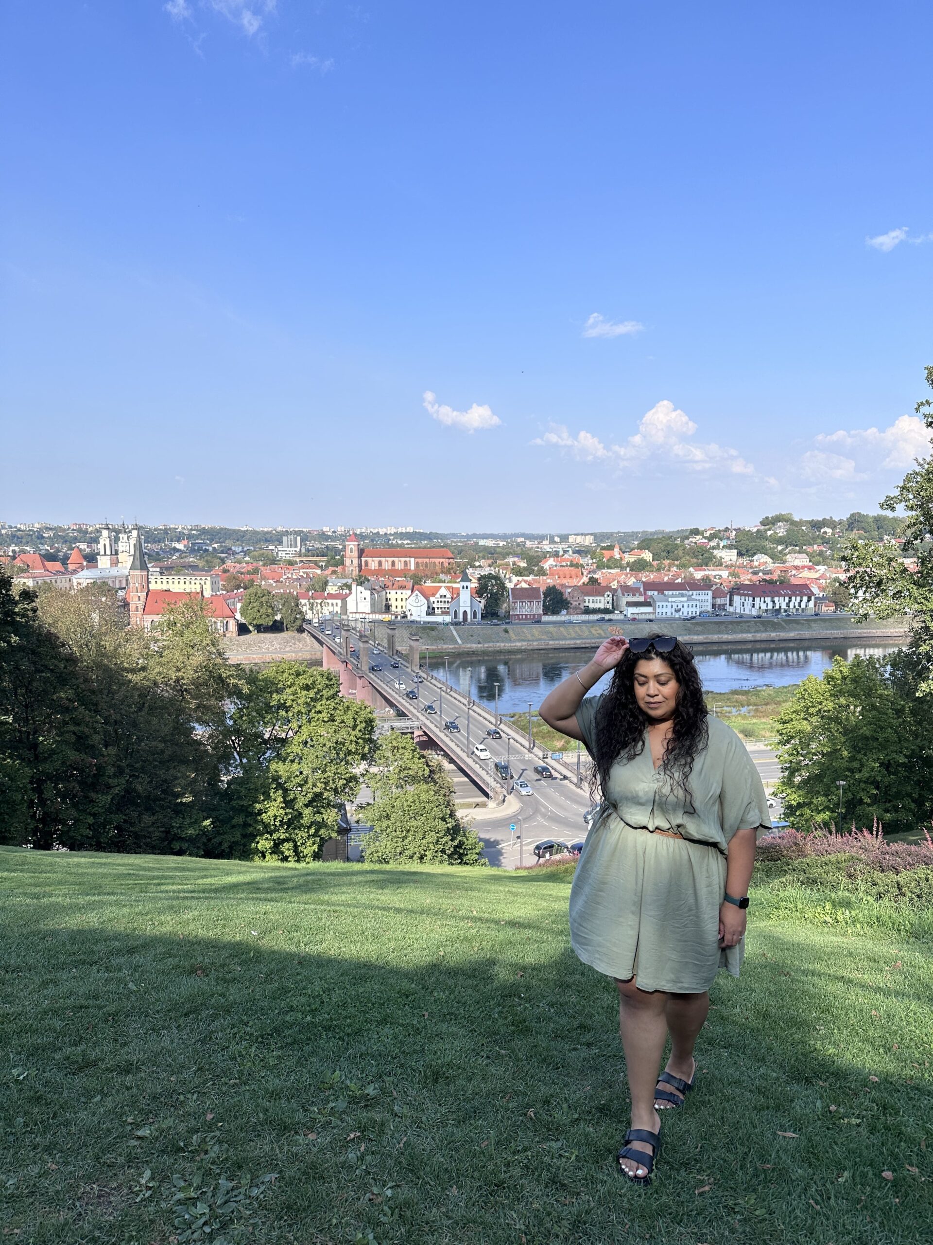 Nishi with the view of Kaunas from Aleksotas Hill behind her