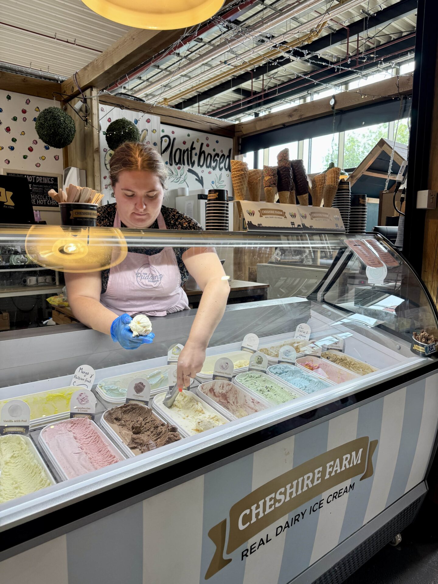 woman serving Cheshire Farm ice cream at Chester Market