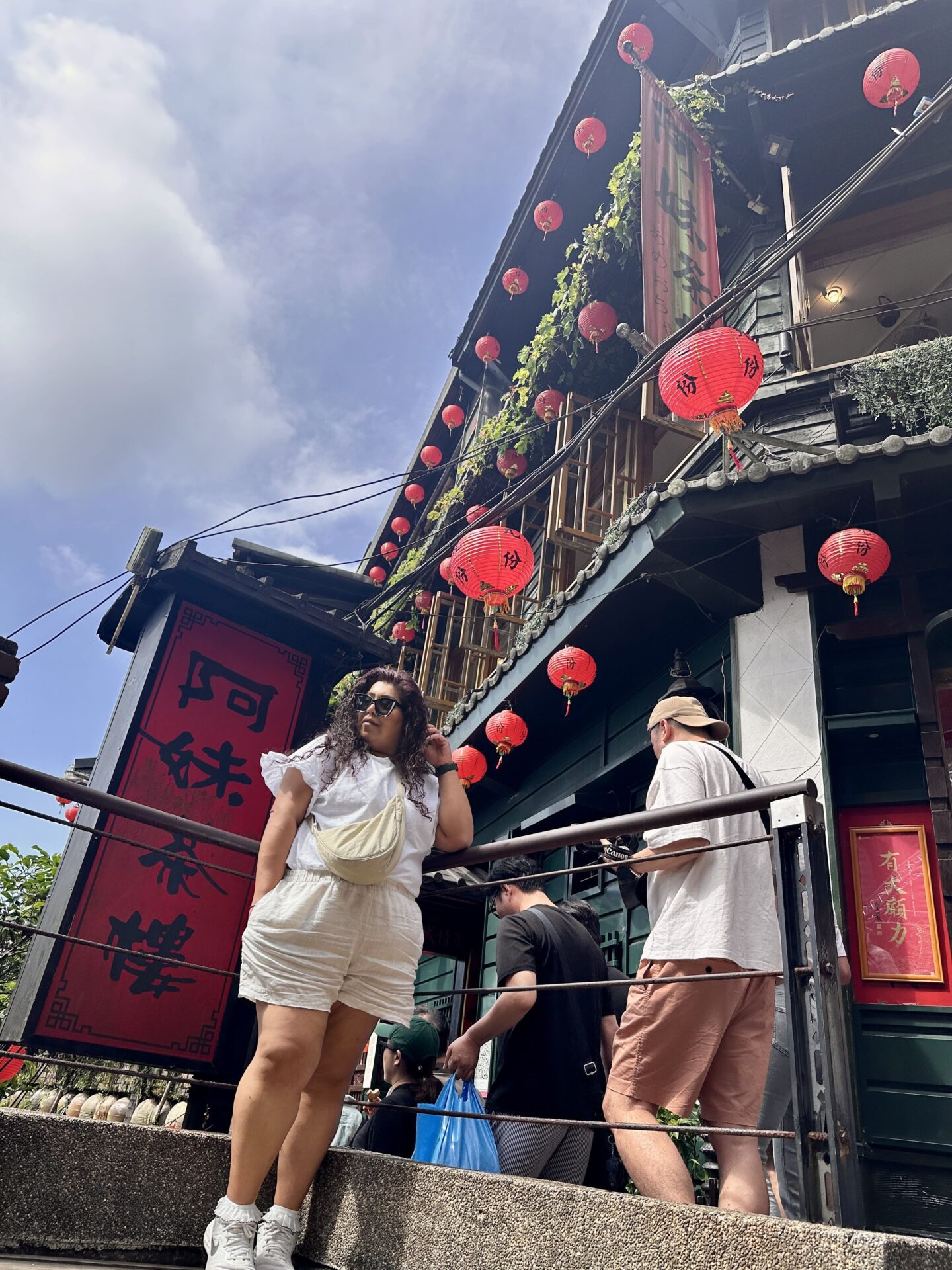 Nishi posing outside A-Mei Teahouse Jiufen