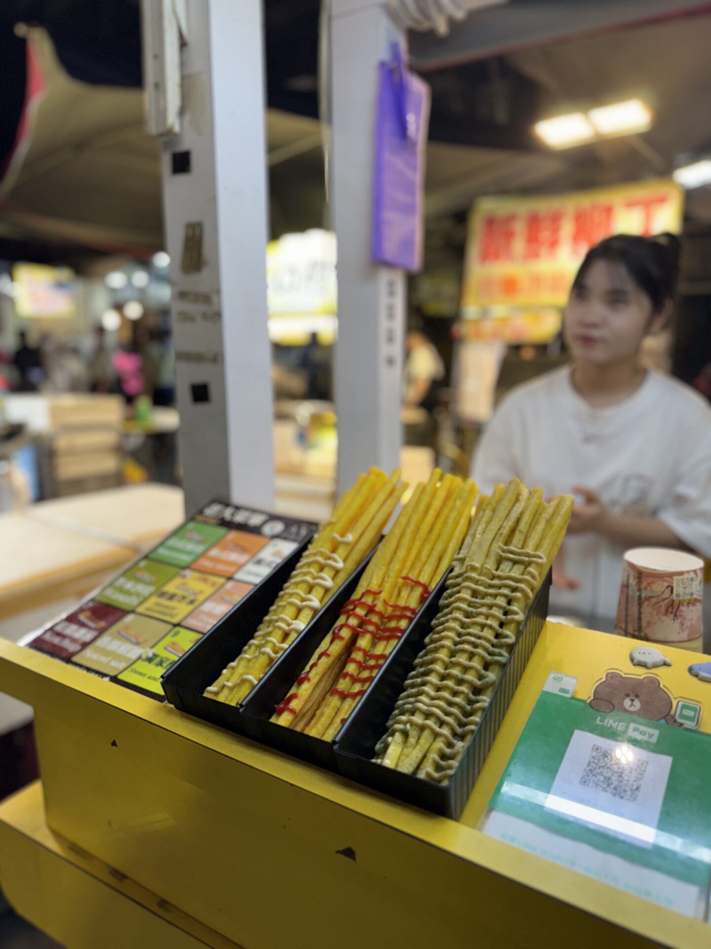 potato sticks street food vendor at Raohe Street Night Market in Taipei