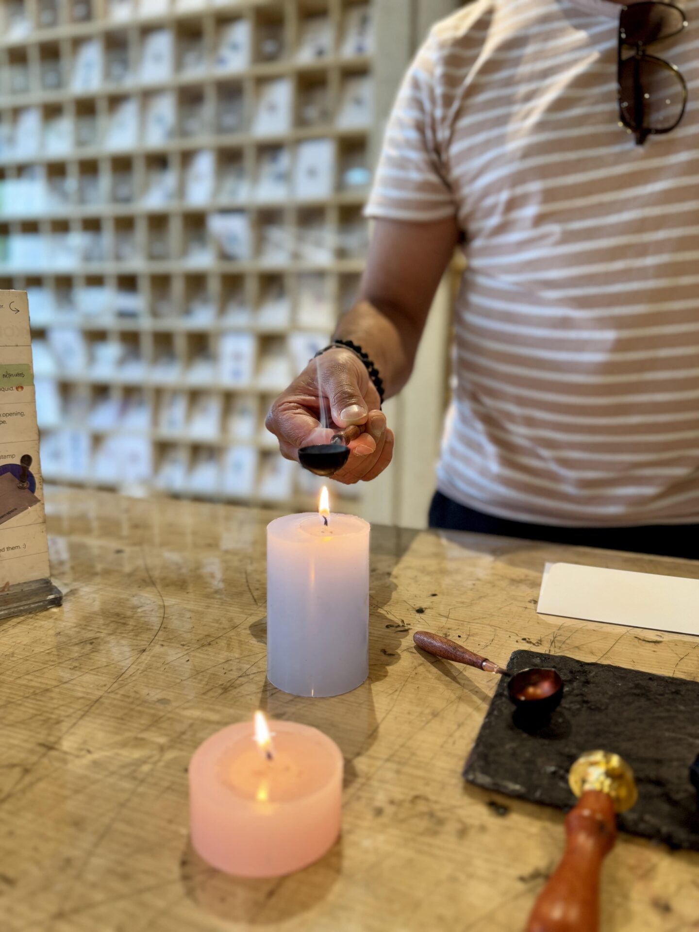 melting wax over a candle